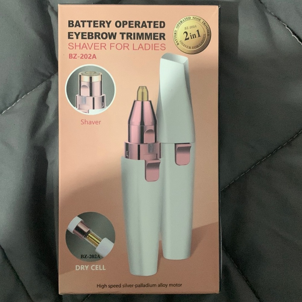 Opened but never used batteries not included eyebrow trimmer
